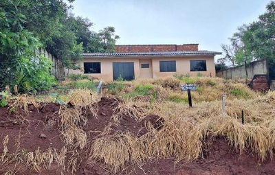 Lote de terreno n° 04, quadra n° 50, com área de 450m², com casa em alvenaria não-averbada - Ponta Grossa, PR